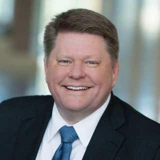 Dean J.