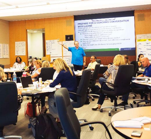 Leader speaking to an audience about CliftonStrengths