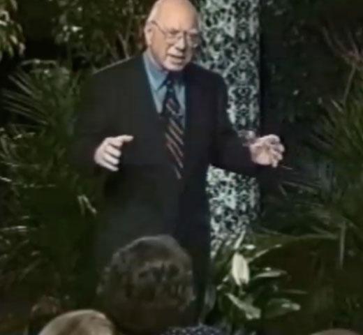 Don Clifton speaking to a group of people